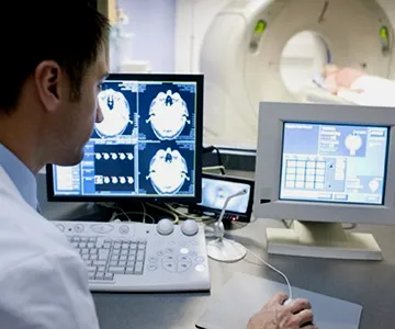 Healthcare technician at desk working