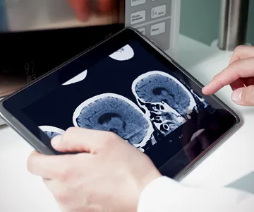 Doctor looking at Xray. Expert tech healthcare